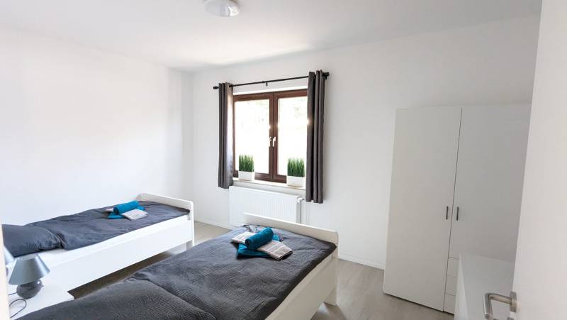 Apartment mit 5 Zimmern und 10 Einzelbetten und 2,5 eigenen Bädern
